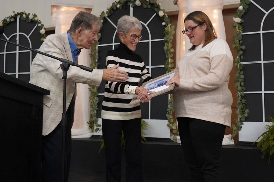 Bill and Barb Hancher present the Timothy Hancher Service Award