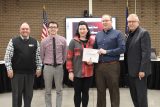 Trent and Melissa Wolfe honored at HCCSC School Board Meeting